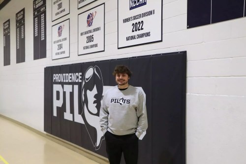 Jordan Peters won the world junior curling championships while a student at Providence College and will lead the program's inaugural season in competitive curling. (Providence College)