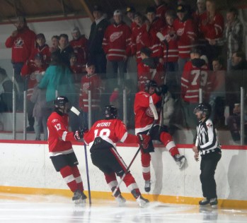 Carter Braun celebrates an early goal for Grunthal during their Hanover Tache Junior Hockey League play-in series against Landmark Feb. 12. The Red Wings defeated the Blues 2-1 in the series and will play Springfield in the quarterfinals. (Cassidy Dankochik The Carillon)