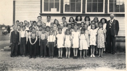 Rosengard students and Jakob Penner, their teacher, 1947.