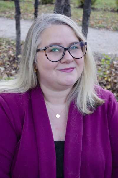 Submitted by Ashley MacLennan 

Sprague author Ashley MacLennan recently released her 41st novel, Tell Me Her Name, which is the first book in a new series spun-off of an existing five-book thriller series written under the pen name of Kate Wiley.