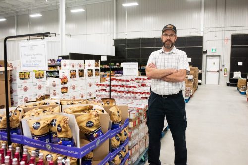 SVJETLANA MLINAREVIC THE CARILLON 

Benco Foods general store manager Alex Robertson, pictured here in the store on March 2, 2026, said the goal of the grocer is to have everyday groceries and bulk staples at affordable prices. The store opened in mid-January in Steinbach after two years of deliveries to the city’s customers. The company was started in 2019 in MacGregor, Manitoba, by Benjamin Unrau.