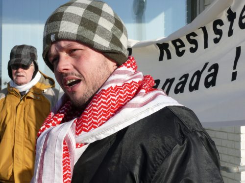 CARILLON ARCHIVES 

Joshua Key, a former U.S. army private who served in Iraq, speaks at a protest outside Vic Toews’ Steinbach office.