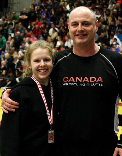 Niverville Wrestling Club Coach Adrian Bruce with Rachel Alder of Oakbank following her silver medal winning performance at the Cadet/Juvenile National Wrestling Championships in Windsor, Ontario.