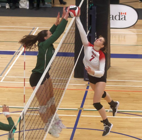 A Lynx d’Édouard-Montpetit player is blocked by Lakeland during the CCAA finals. (Cassidy Dankochik The Carillon)