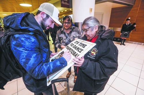 JOHN WOODS / FREE PRESS
Team Dunstone third, Colton Lott, is greeted by fans Marsha and Margaret Simmons as he arrives at Winnipeg Airport Monday, March 9, 2026 after his team won the Brier yesterday.  

reporter: taylor
