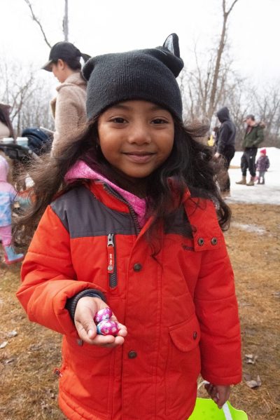 SVJETLANA MLINAREVIC THE CARILLON
Nysoa Ramilison,5, shows some of the chocolate eggs she collected during the Great Easter Egg Hunt at Mennonite Heritage Village on April 4, 2026. More than 60,000 chocolate eggs and A&W lollipops were thrown to about 100 kids who attended the annual event.