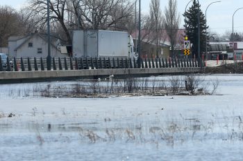 SHANNON VANRAES / WINNIPEG FREE PRESS ARCHIVES 

The Morris River laps the bottom of a bridge north of Morris, Manitoba on April 17, 2020. The province has begun work developing an estimated $83-million plan to replace the 57-year-old bridge. Construction is expected to begin in 2028.