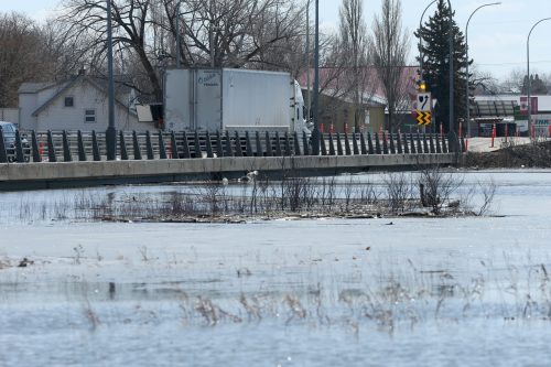 SHANNON VANRAES / WINNIPEG FREE PRESS ARCHIVES 

The Morris River laps the bottom of a bridge north of Morris, Manitoba on April 17, 2020. The province has begun work developing an estimated $83-million plan to replace the 57-year-old bridge. Construction is expected to begin in 2028.