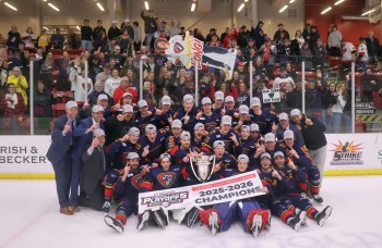 The Niverville Nighthawks celebrate their Turnbull Cup championship with some of the fans who made the trip to Virden to watch them win game four 6-2. (Cassidy Dankochik The Carillon)
