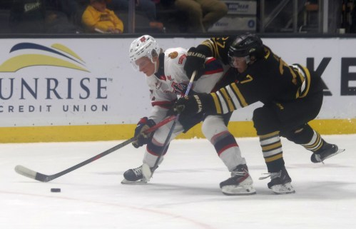 Zach Lansard shields the puck during WHL action against Brandon earlier this season. (Cassidy Dankochik Carillon Archives)