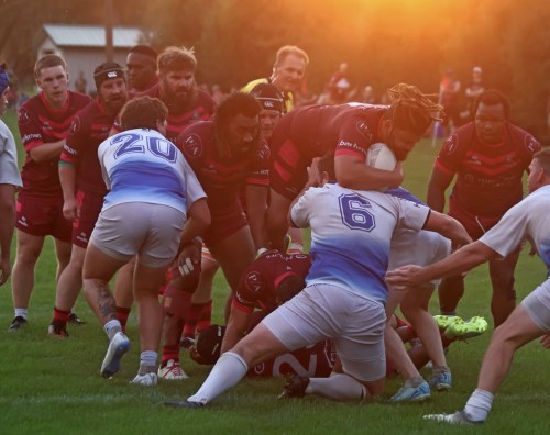 An Eastman Warriors player spills forward for a try underneath the summer sun. (Cassidy Dankochik Carilllon Archives)