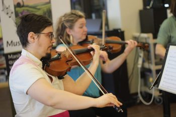 MATTHEW FRANK THE CARILLON 

Trevor Kirczenow, co-founder for non-profit Manitoba Mobile Music, plays his violin during a string quartet concert at Grunthal’s Menno Home For The Aged on March 31.
