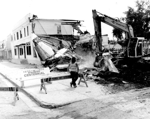 CARILLON ARCHIVES
A backhoe and bulldozer took three days to break down the sprawling, two-storey, Tourist Hotel, in July of 1976, to make way for a shopping centre parking lot on Main Street.