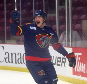 Niverville's Dawson Zeller celebrates a first-period goal against Thunder Bay during Centennial Cup action. (Cassidy Dankochik The Carillon)