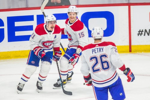MIKAELA MACKENZIE / WINNIPEG FREE PRESS



Montreal Canadiens Brendan Gallagher (left) and Jesperi Kotkaniemi skate up to Jeff Petry to celebrate a goal in the third period at Bell MTS Place in Winnipeg on Wednesday, June 2, 2021. For --- story.

Winnipeg Free Press 2021.
