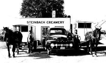 CARILLON ARCHIVES 

Henry Kehler, Bill Sobering and Bill Giesbrecht use two horse drawn rigs and a light delivery truck to deliver homogenized, pasteurized milk to Steinbach’s 2,100 residents daily.