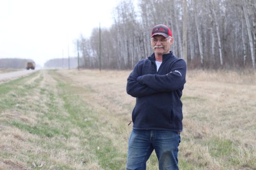 MATTHEW FRANK THE CARILLON 

Rural Municipality of Hanover Ward 4 Coun. Ed Penner overlooks the proposed site of a cell tower near Sarto. The tower was announced by firm SLI Towers roughly two years ago, but Penner says no work has started and communication with the company has gone dark.