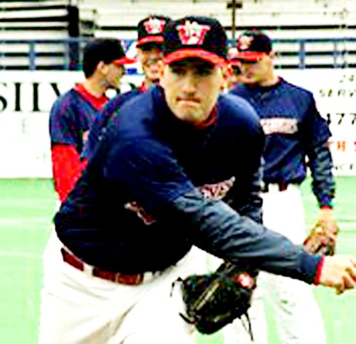 Dean Sproule of Giroux warms up on the mound, trying to crack the lineup of the 1996 Winnipeg Goldeyes.