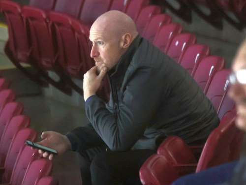 Nighthawks general manager Mike MacAulay keeps a close eye on the action on the ice during the Centennial Cup in Summerside, P.E.I. May 13. (Cassidy Dankochik The Carillon)