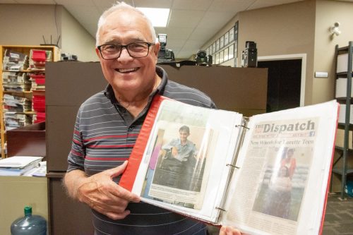 SVJETLANA MLINAREVIC THE CARILLON
Bob Barrow holds a binder filled with children he has helped get wheelchairs in the Southeast through the charity Tabs for Wheelchairs on May 27, 2026.