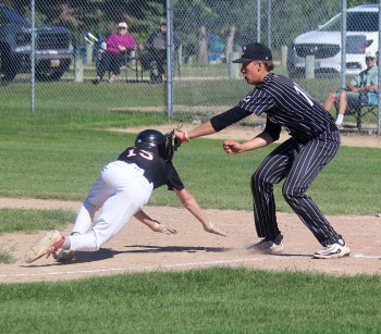 Ryan Powers may have pitched a combined scoreless six innings with nine strikeouts between both games of Carillon's double-header against Pembina Valley, but his most critical play may have been at home plate, tagging out a Orioles runner after an attempted suicide squeeze play. (Cassidy Dankochik The Carillon)