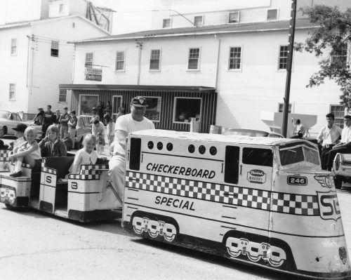 CARILLON ARCHIVES 

The Checkerboard Special, with Chuck Toews at the controls, gave Steinbach residents their first look at a train on Main Street, during a 1968 parade, and three years later, Mayor A.D. Penner brought the idea to the council table as a way of providing a ride downtown to shoppers who have to park farther away from stores.
