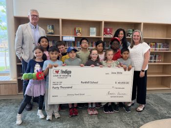 Submitted Photo by Hanover School Division 

Hanover School Division superintendent Joe Thiessen stands with Parkhill School principal Kim Koop and students as they announced a $40,000 grant from the Indigo Love of Reading Foundation.