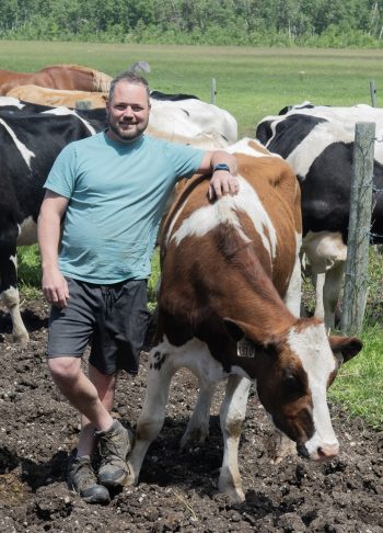 SVJETLANA MLINAREVIC THE CARILLON
Dairy farmer Stefan Signer stands with one of his cows on his farm near Kleefeld on June 18, 2026. Signer is one producer in the agricultural sector who is worried about the unknown outcomes if a deal can’t be reached regarding the Canada-United States-Mexico deal that is currently being renegotiated.