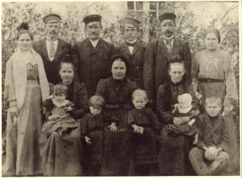 My mother, a toddler in the company of her grandmother, and her loving family ca 1906.