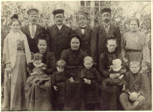 My mother, a toddler in the company of her grandmother, and her loving family ca 1906.