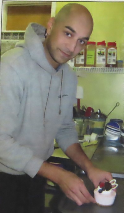 CARILLON ARCHIVES
Mark Oommen works hard at keeping alive his mother’s  legacy at Ruth’s Kitchen at the Red River College campus near the family home in Steinbach.