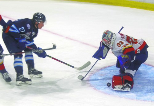 Cassidy Dankochik The Carillon 

Austin Dubinsky makes a save in tight during Niverville’s semi-final clinching win over Alberta champions Canmore during the Centennial Cup group stage.