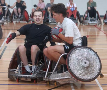 A pair of wheelchair rugby players crash into each other during a game at the SEC. (Cassidy Dankochik The Carillon)