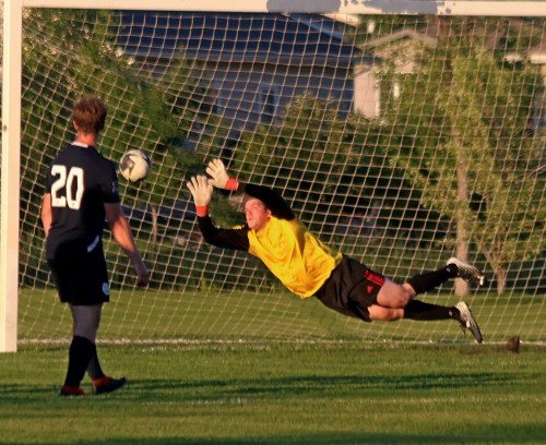Hanover Kickers keeper Liam Hodges needed every inch of his reach to stop this free kick attempt from Grant Park Sporting Club in MMSL Div 1 action at the Steinbach Soccer Park July 6. (Cassidy Dankochik The Carillon)