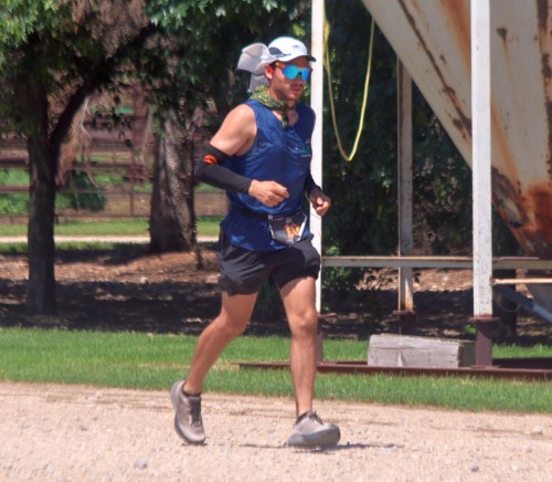Nick Burmey rounds the final turn of the 4.1 mile long Old Tom Backyard Ultra track, which crisscrosses across farm properties near Blumenort. Burmey battled for 55 hours to win the event, earning a spot on Team Canada at the upcoming world championships. (Cassidy Dankochik The Carillon)