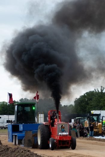 SVJETLANA MLINAREVIC THE CARILLON
Smoke billows out of Sam Bell's Allis Chamers tractor during the smoker class at the first Gardenton Truck and Tractor Pull on Aug. 15, 2026. Bell pulled 387.94 feet.