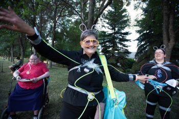 SVJETLANA MLINAREVIC THE CARILLON
La Broquerie resident Ruth Nadeau celebrates after finding out she raised the highest number of donations ($345). She and friend Melanie Bremaud walked in the LIght Up the NIght fundraiser for the Grunthal Soup Kitchen and Steinbach's Agape House at L.A. Barkman Park on Aug. 22, 2026. Nadeau said she had a friend who used Agape House and she was there to support the organizations.  The event saw about 40 people walk and raised more than $3,700.