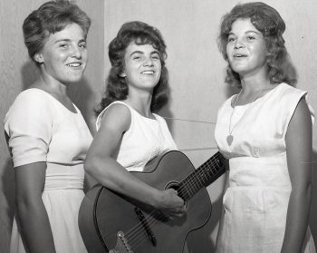 CARILLON ARCHIVES 

The Schroeder sisters of Kleefeld turned out to be a big hit at the amateur show on the last night of the 1963 Hanover Fair. Alvina, 17, Martha 18, and Mary, 15, say they have been singing for just about as long as they can remember.