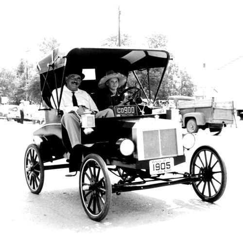 CARILLON ARCHIVES 

Peter J. Toews, a man who can neither walk a step nor move a finger, built this replica of a 1905 Model ‘N’ Ford using the borrowed hands of neighborhood boys including 12-year-old Paul Peters, who is at the controls during the 1963 Hanover Fair parade.