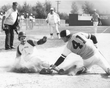 Carillon photographer Tim Plett freezes the action at home plate to create an instant replay moment during the 1984 Manitoba Intermediate Fastball championships at Friedensfeld. Ste Anne Saints’ third base coach Ike Fehr, tournament MVP Jake St Vincent and the Gimli catcher all wait for umpire Earl Reckseidler’s call.