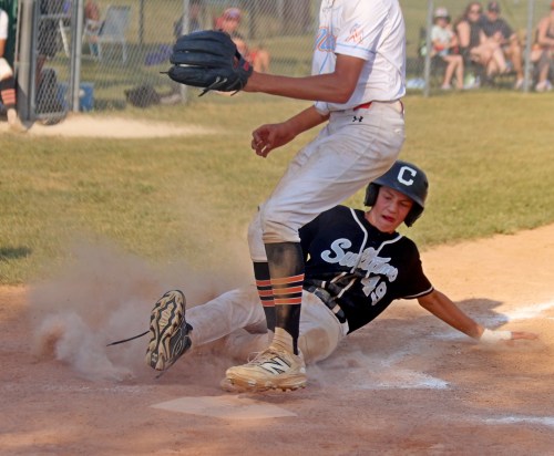 A Carillon Sultans 13U player slides into home base during their nine-run provincials-clinching victory over Brandon Aug. 2. (Cassidy Dankochik The Carillon)