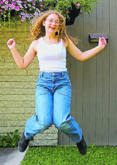 GRAHAM WALKER THE CARILLON 

Kora Dyck shows off her enthusiasm for being a professional actor during a break in her schedule while outside the Steinbach Arts Council building.
