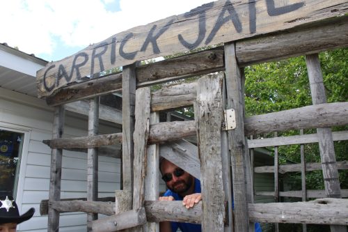 GREG VANDERMEULEN CARILLON ARCHIVES 

La Verendrye MLA Konrad Narth peers out of the jail at last year’s Carrick Days event. Proceeds raised in the unique event help fund their annual event.