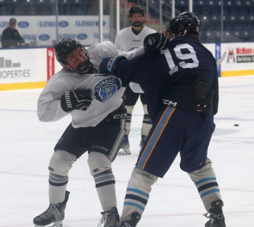 Brody Sawatzky and Bradley Janzen get into a scrum during Steinbach Pistons prospects camp. (Cassidy Dankochik The Carillon)