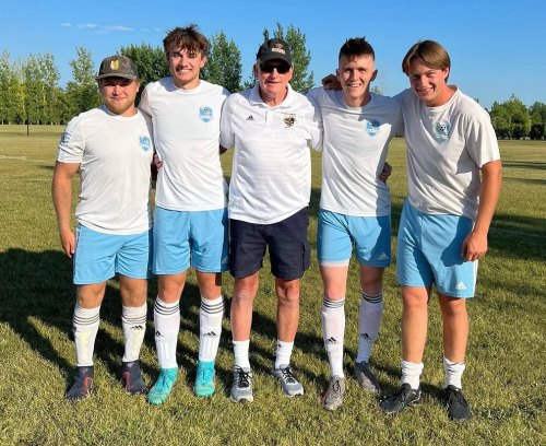 Walt McKee (centre) was a key figure across Manitoba soccer, including time coaching senior and youth teams in Niverville. (Niverville Force Instagram)