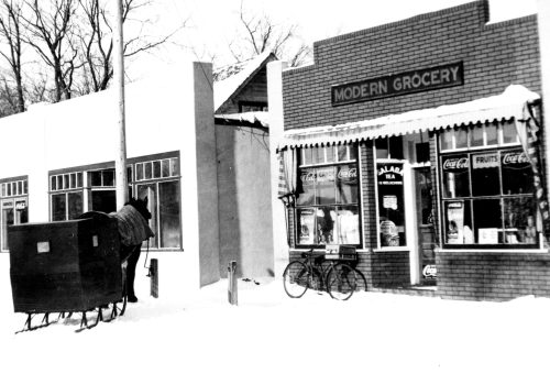 CARILLON ARCHIVES
Service was always a top priority for Jac A. Penner at Modern Grocery. The bicycle propped up against the store, and the horse hitched to a post out front, in this 1948 photo were the earliest grocery delivery vehicles.