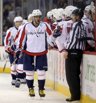 Washington Capitals' Alex Ovechkin (8) celebrates with his line after Nicklas Backstrom (19) scored against the Winnipeg Jets' in Winnipeg, Saturday, December 5, 2015. (TREVOR HAGAN/WINNIPEG FREE PRESS)