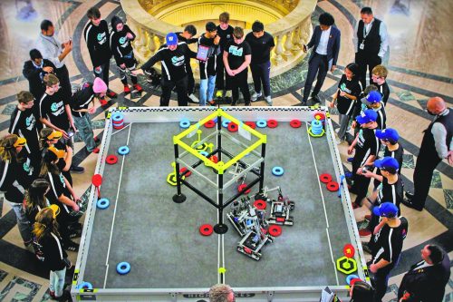 Photo by Taylor Friesen
Morris Robotics was invited to the Manitoba Legislature by Laurent Stone, MLA for Midland. The Deputy Premier of Manitoba Uzoma Asagwara, Minister of Education Tracy Schmidt, and the Minister of Innovation and New Technology Mike Moroz came out to see the demonstration on March 25, 2025. Morris Robotics Team Blue Bombur will be representing Manitoba at the VEX Robotics World Championship in Dallas, Texas, in May.