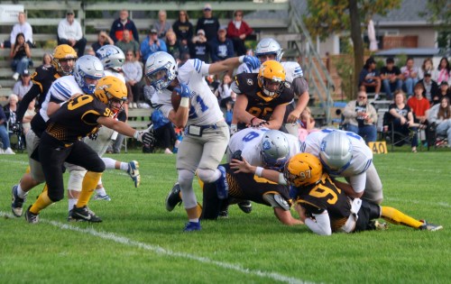 Oak Park's Rylan Baylis rumbles through Steinbach's defense during the Raiders 69-14 season opening win at A.D. Penner Park. (Cassidy Dankochik The Carillon)