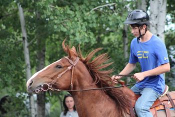 GREG VANDERMEULEN THE CARILLON
Wind flies through the mane of Nathan Driedger's horse as he participates in the 22nd annual Sundown Gymkana on Aug. 29, 2026.